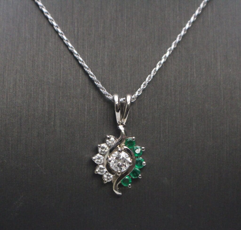 14KW Emerald and Diamond Pendant on a 14KW Rope Chain 24"