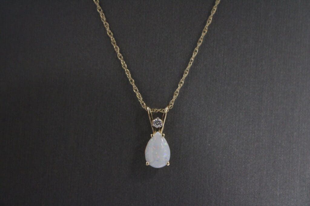14KY Pear Shape Opal & Diamond Pendant on a 14KY 18" Rope Chain
